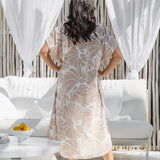 Back view of Sand and White Shell Maxi Kaftan displaying shell graphic pattern
