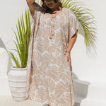 Plus size model wearing Sand and White Shell Maxi Kaftan showing relaxed fit and drape