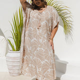 Plus size model wearing Sand and White Shell Maxi Kaftan showing relaxed fit and drape