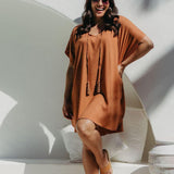 Front view of the Mocha Mousse short kaftan dress highlighting the kimono sleeves and elegant drape