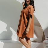 Side view of the Mocha Mousse short kaftan dress on a size S/M model, showing kimono sleeve drape and fluid silhouette