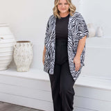 Front view of black and grey zebra print kimono cape with relaxed open drape