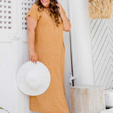 Side profile of the Caramel Scatter Dot Maxi Dress on ML curve model showing flowing shape