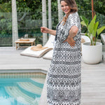 Side view of geo print maxi kimono jacket in breathable cotton with adjustable drawstring waist