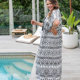 Side view of geo print maxi kimono jacket in breathable cotton with adjustable drawstring waist