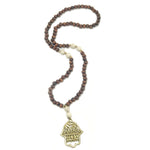 Fatima Hand pendant necklace - brown cream gold beads
